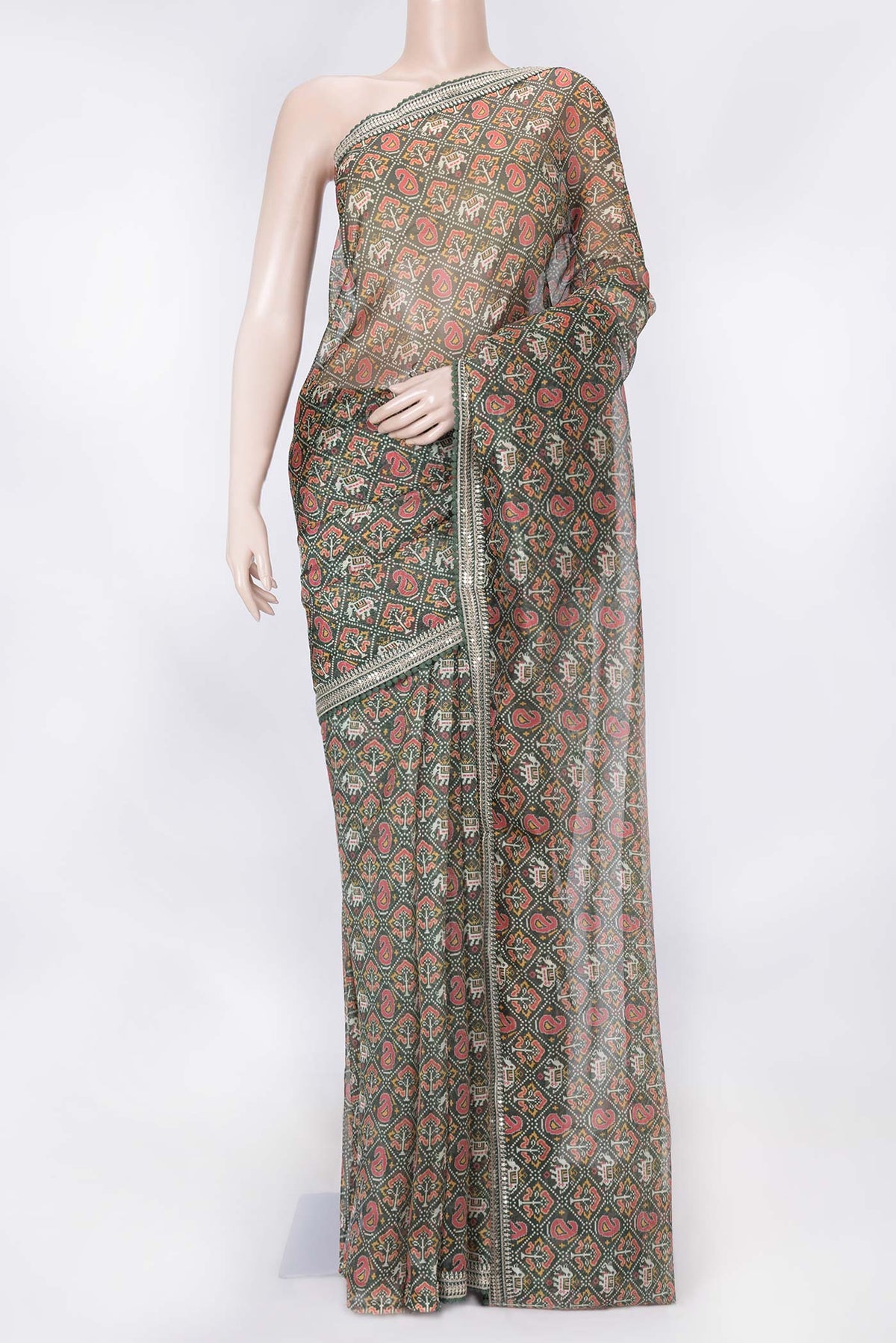 Green Dual Tone Organza Silk Saree with Printed design on the body and Embroidery Border displayed on a mannequin