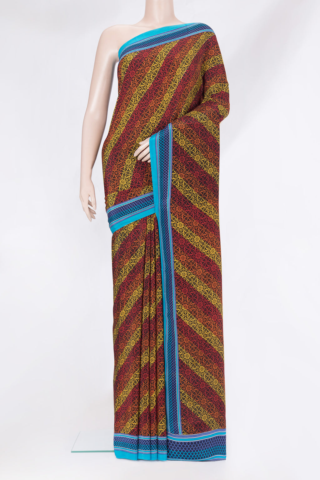 Multi Color Crepe Saree with Printed design on the body and Printed Border.  displayed on a mannequin