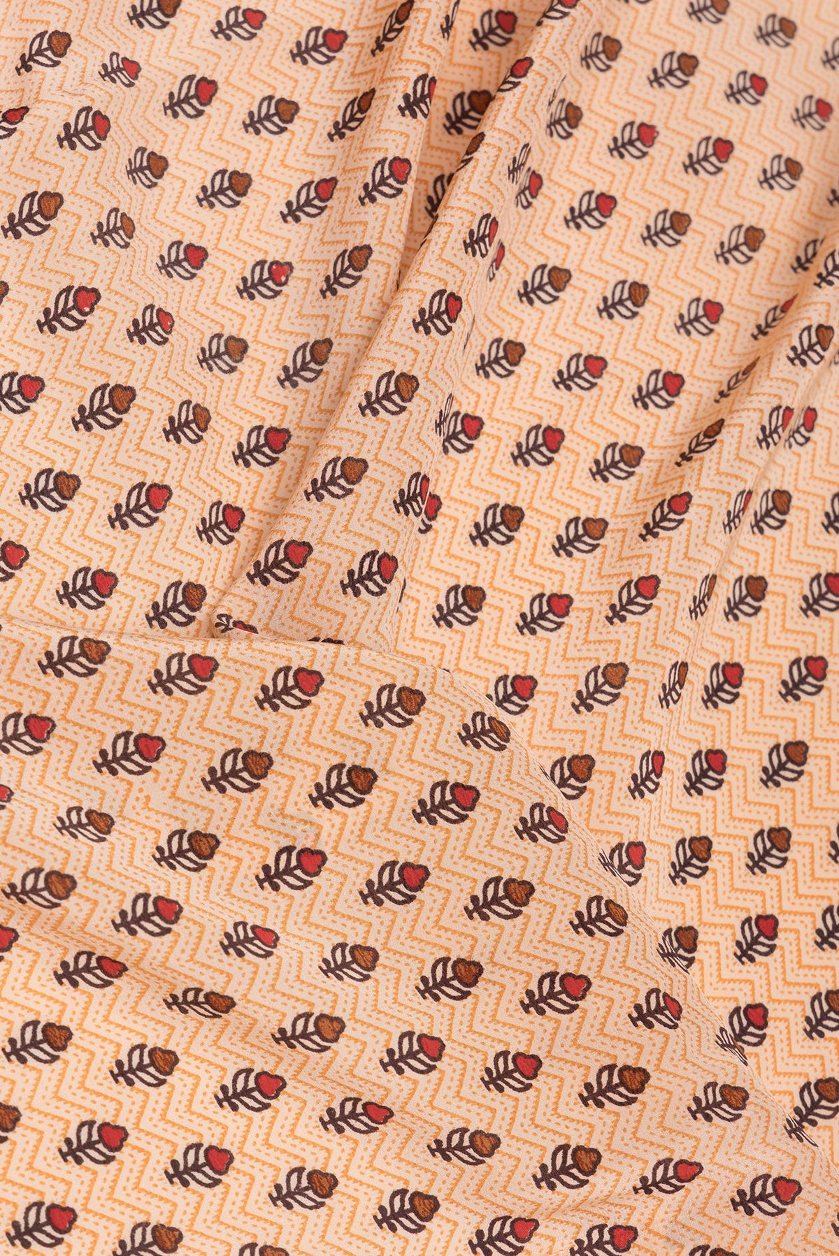 Close up of Sandal Dual Tone Crepe Saree with Printed design on the body and Printed Border.  displaying folds