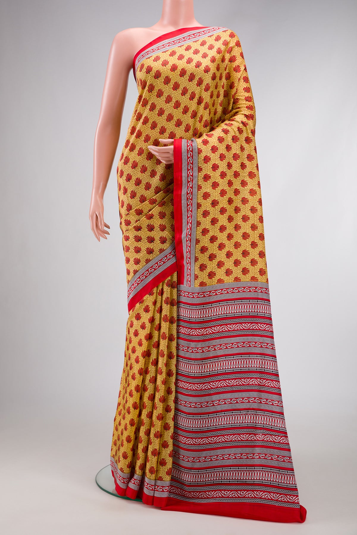 Sandal Dual Tone Mysore Crepe Saree with Printed design on the body and Printed Border.  displayed on a mannequin