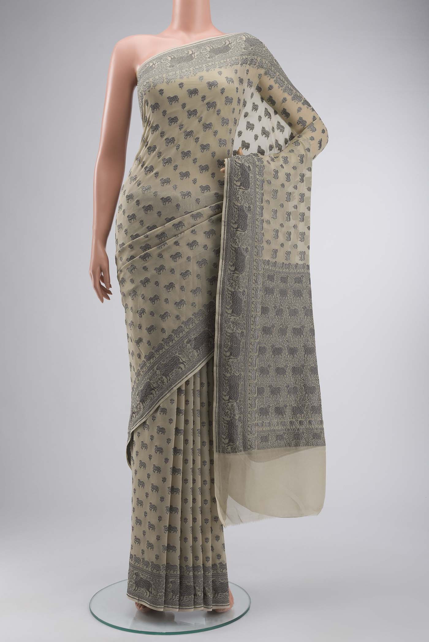 Beige Banarasi Georgette Saree with Zari Butta on the body and Zari Border displayed on a mannequin