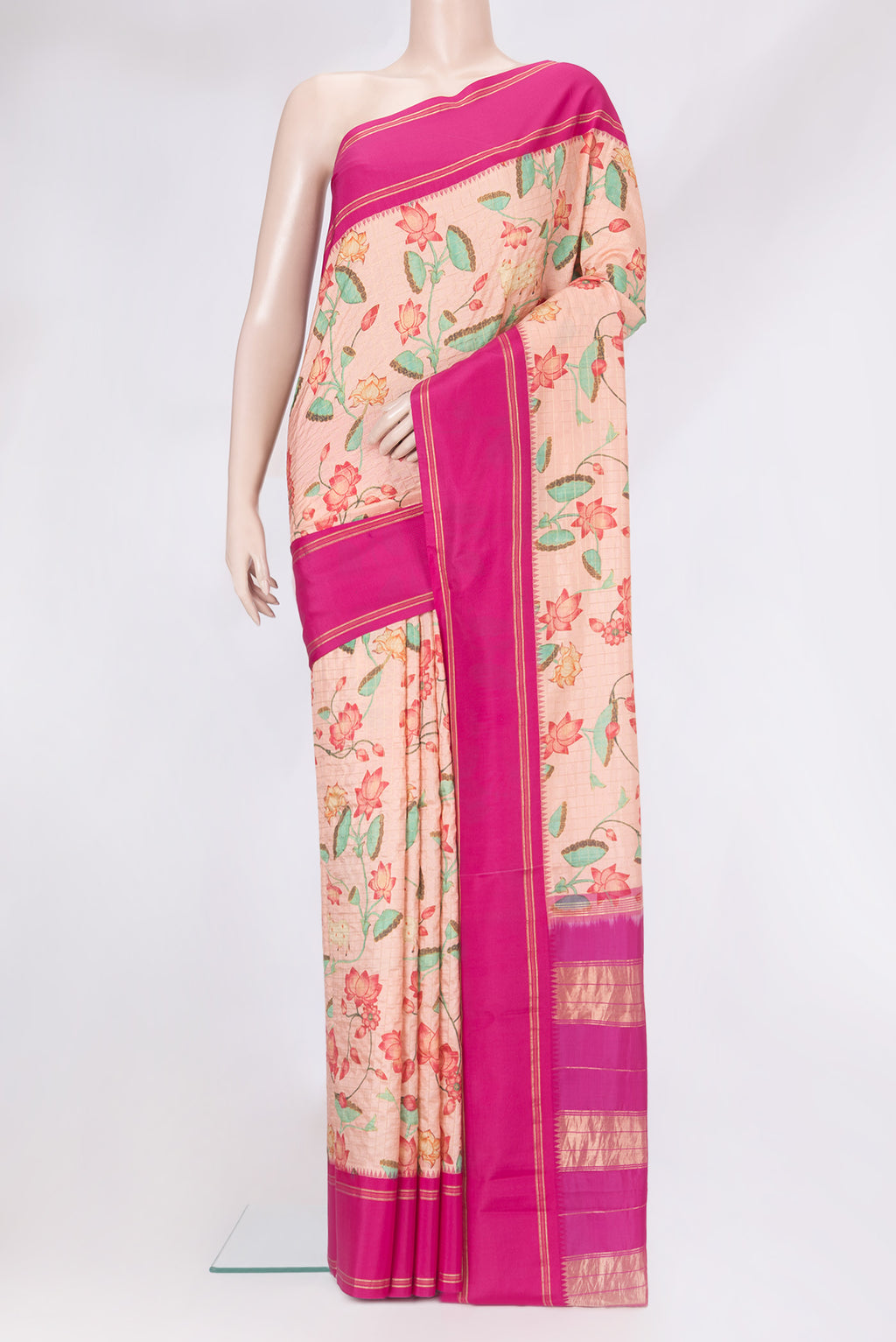 Rose Gold Dual Tone Kanjivaram Silk Saree with Checked design on the body and Zari Border.  displayed on a mannequin