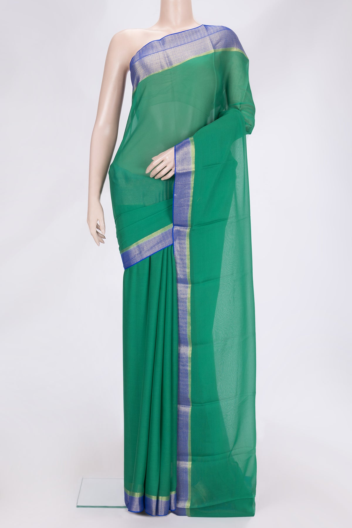 Green Dual Tone Mysore Georgette Saree with Plain Body and Zari Border.  displayed on a mannequin