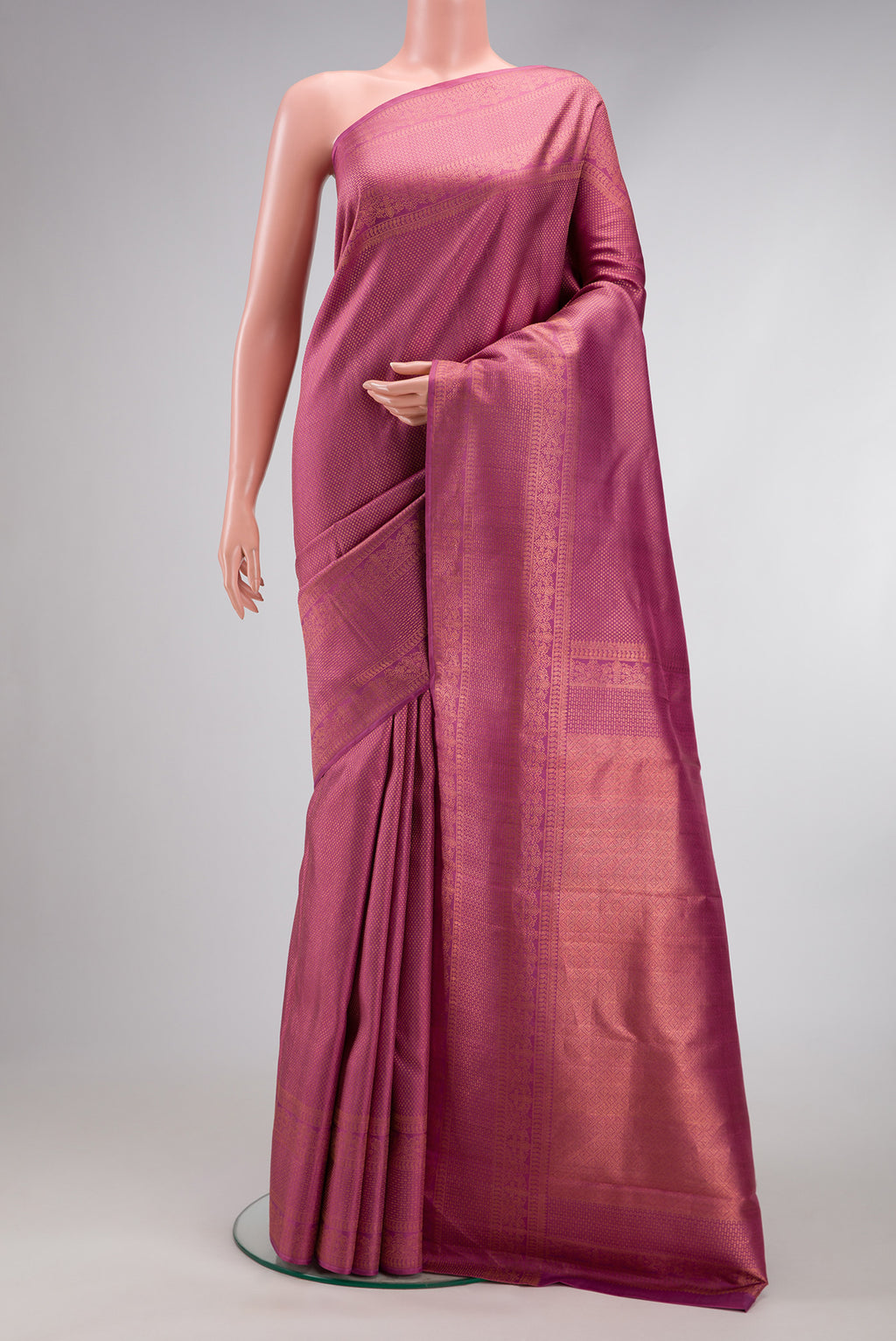 Pink Dual Tone Kanjivaram Silk Saree with Zari Brocade on the body and Fancy Border.  displayed on a mannequin