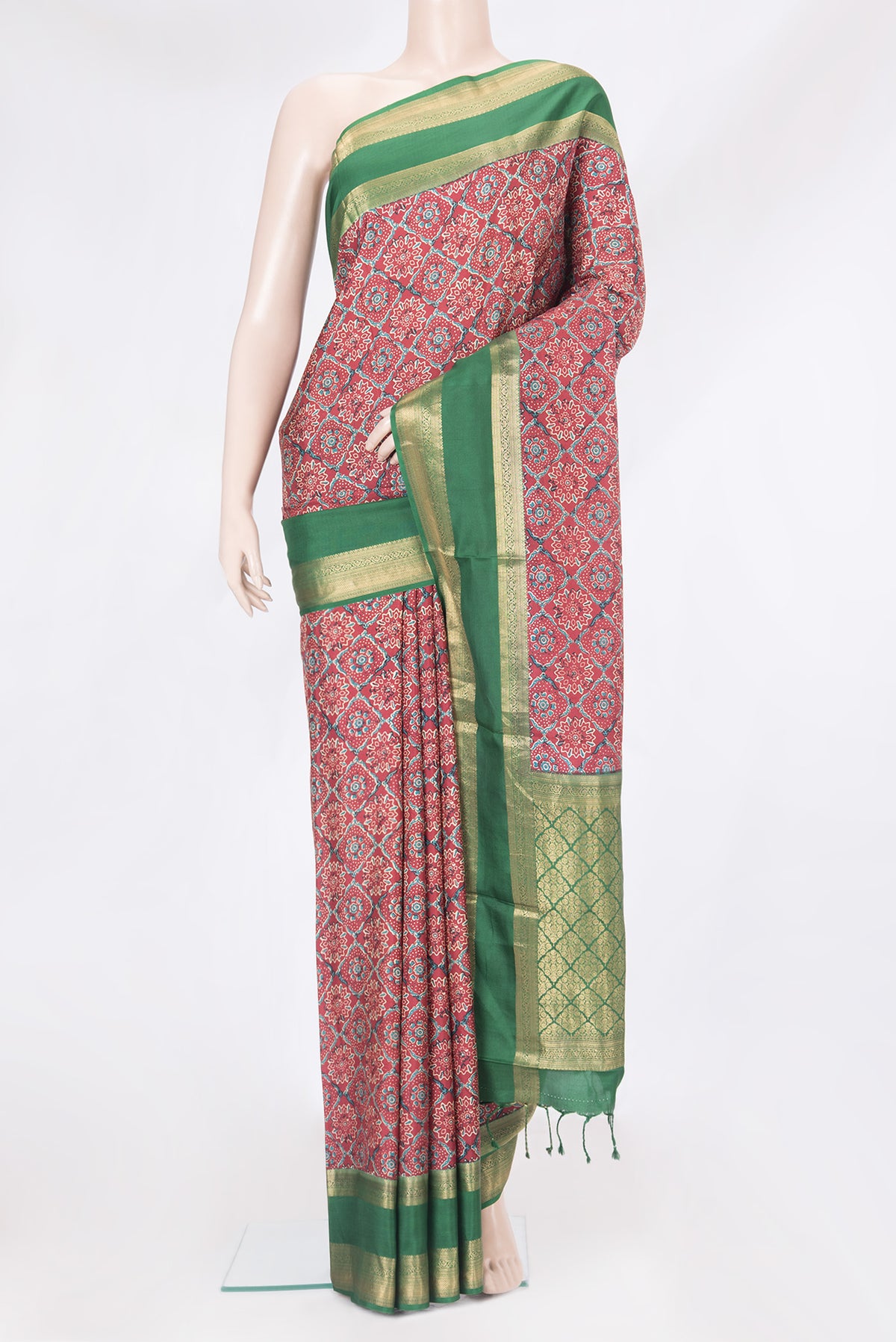 Maroon Dual Tone Kanjivaram Silk Saree with Printed design on the body and Zari Border.  displayed on a mannequin