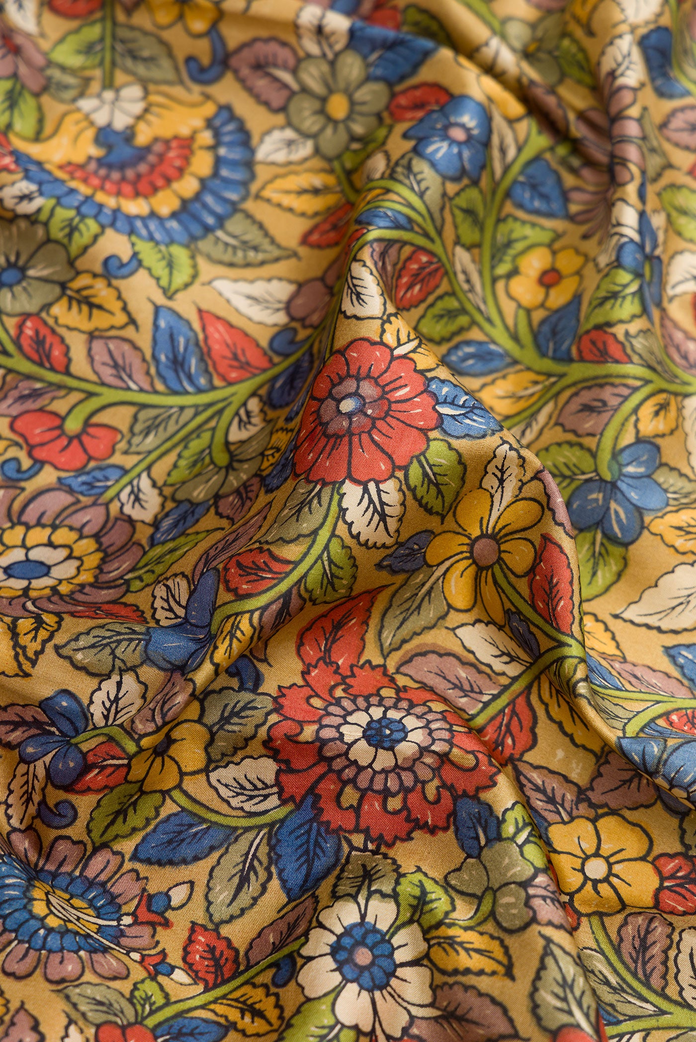 Close up of Green Dual Tone Kanjivaram Silk Saree with Printed design on the body and Zari Border.  displaying folds