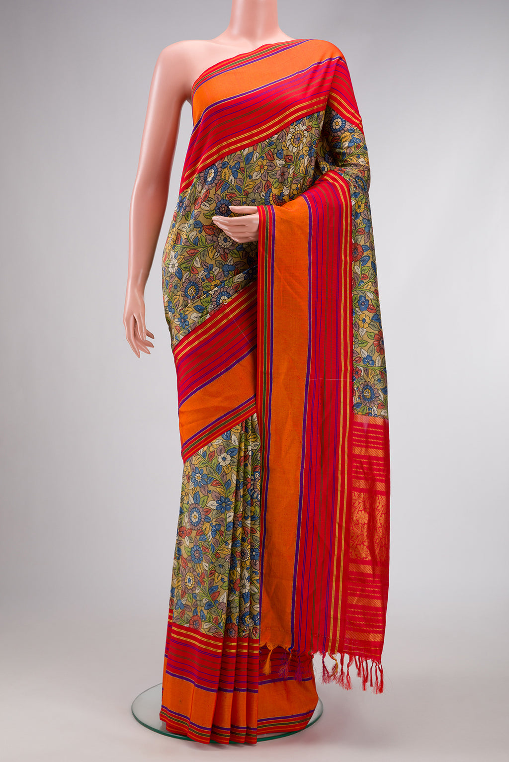 Green Dual Tone Kanjivaram Silk Saree with Printed design on the body and Zari Border.  displayed on a mannequin