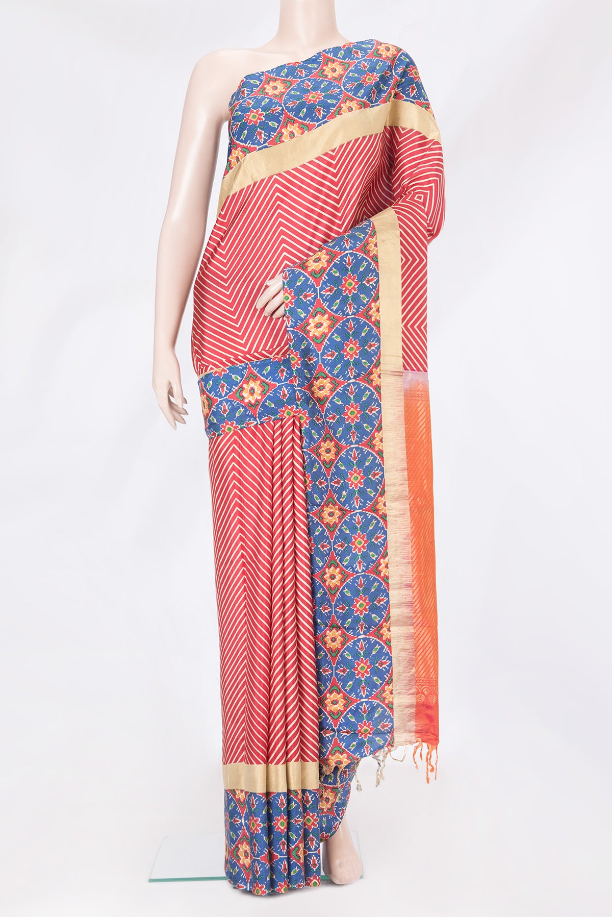 Red Dual Tone Kanchipuram Silk Saree with Printed design on the body and Printed Border.  displayed on a mannequin