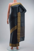 Grey Satin Silk Saree with Plain Body and Zari Border displayed on a mannequin