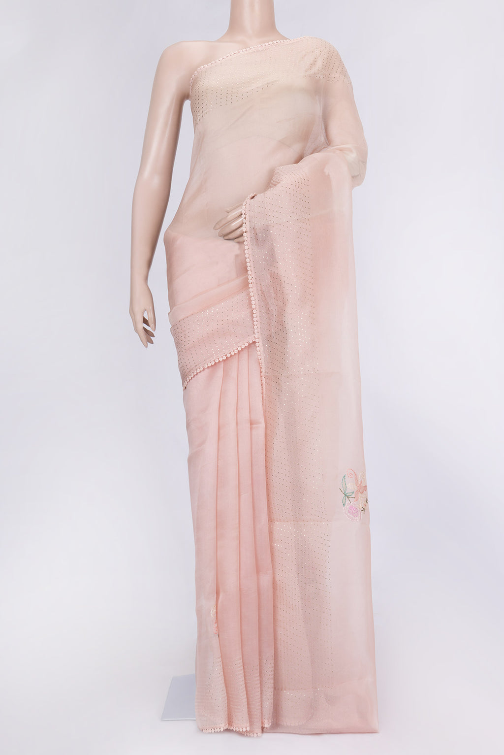 Peach Dual Tone Organza Silk Saree with Embroidery on the body and Embroidery Border.  displayed on a mannequin