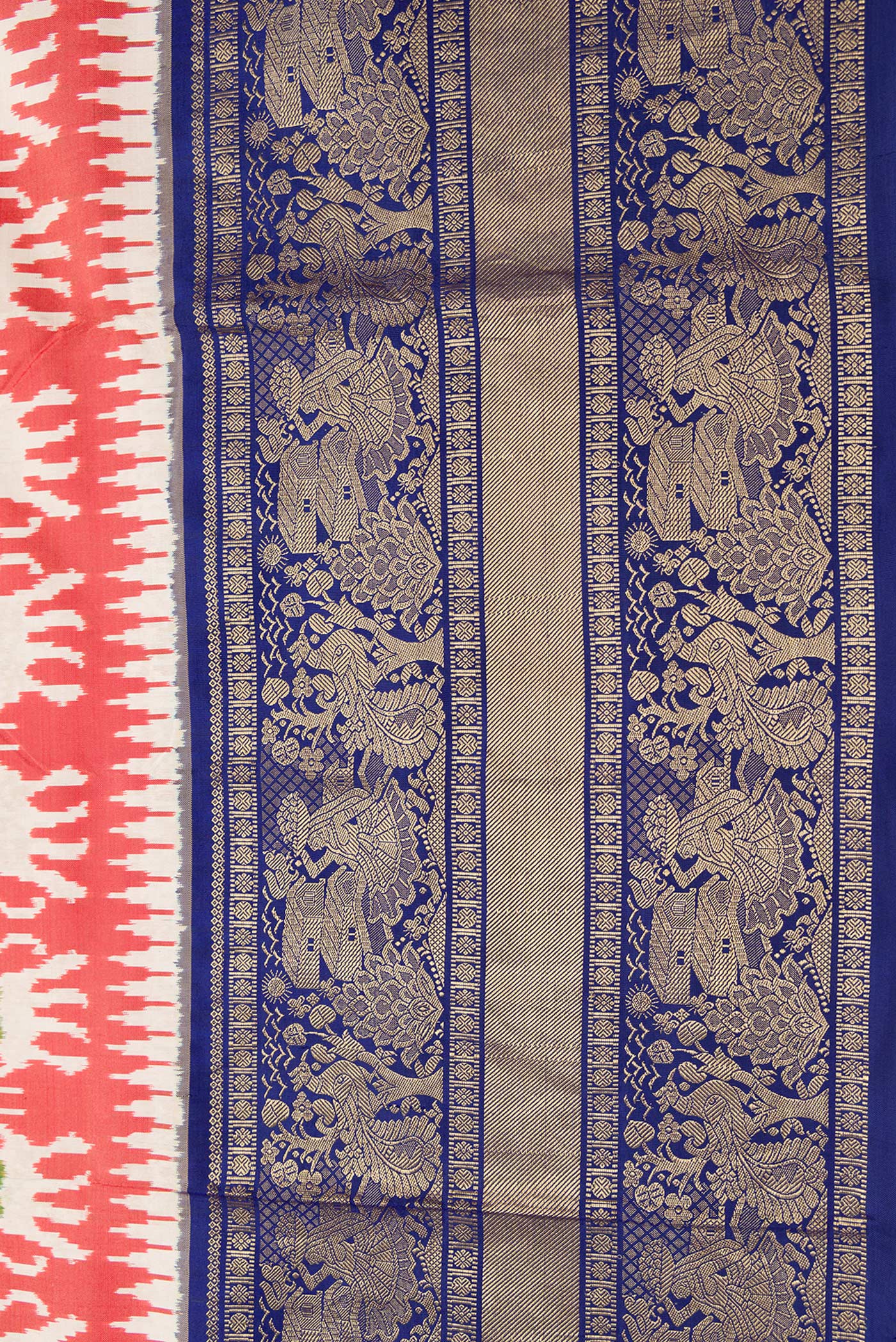 Border image of Maroon Dual Tone Double Ikat Saree with Ikat Print on the body and Zari Border. 