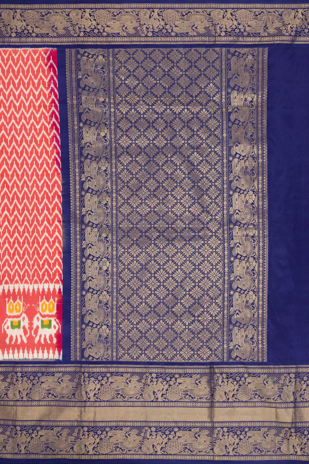 Close up image of the pallu of Maroon Dual Tone Double Ikat Saree with Ikat Print on the body and Zari Border. 