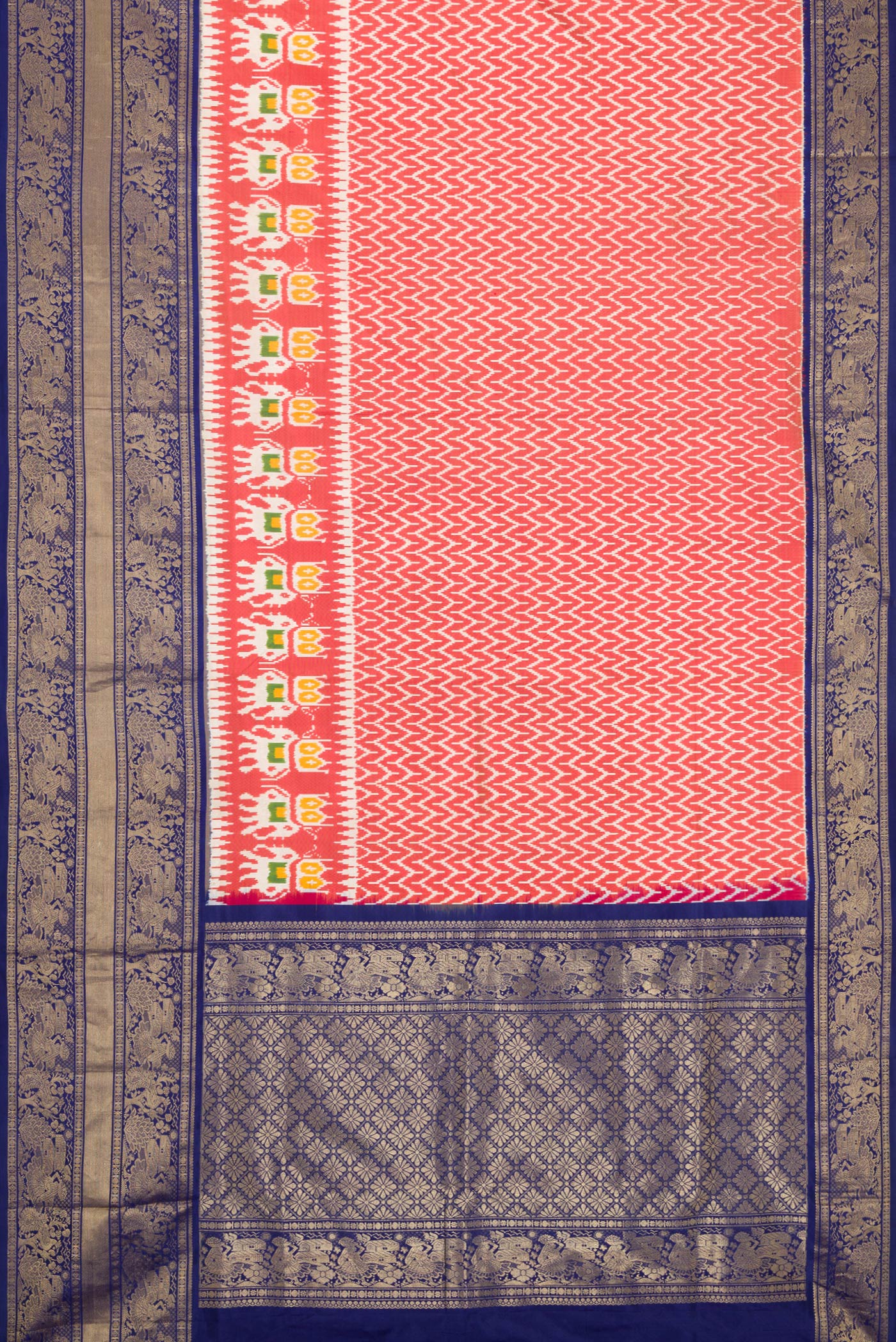 Flat view of Maroon Dual Tone Double Ikat Saree with Ikat Print on the body and Zari Border. 