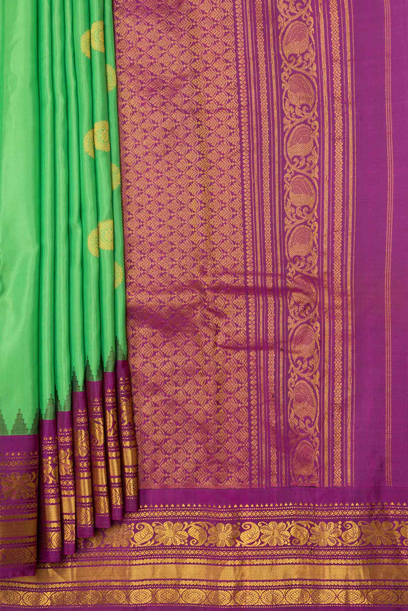Pleats and pallu of Parrot Green Dual Tone Gadwal Silk Saree with Zari Butta on the body and Ganga Jamuna Border