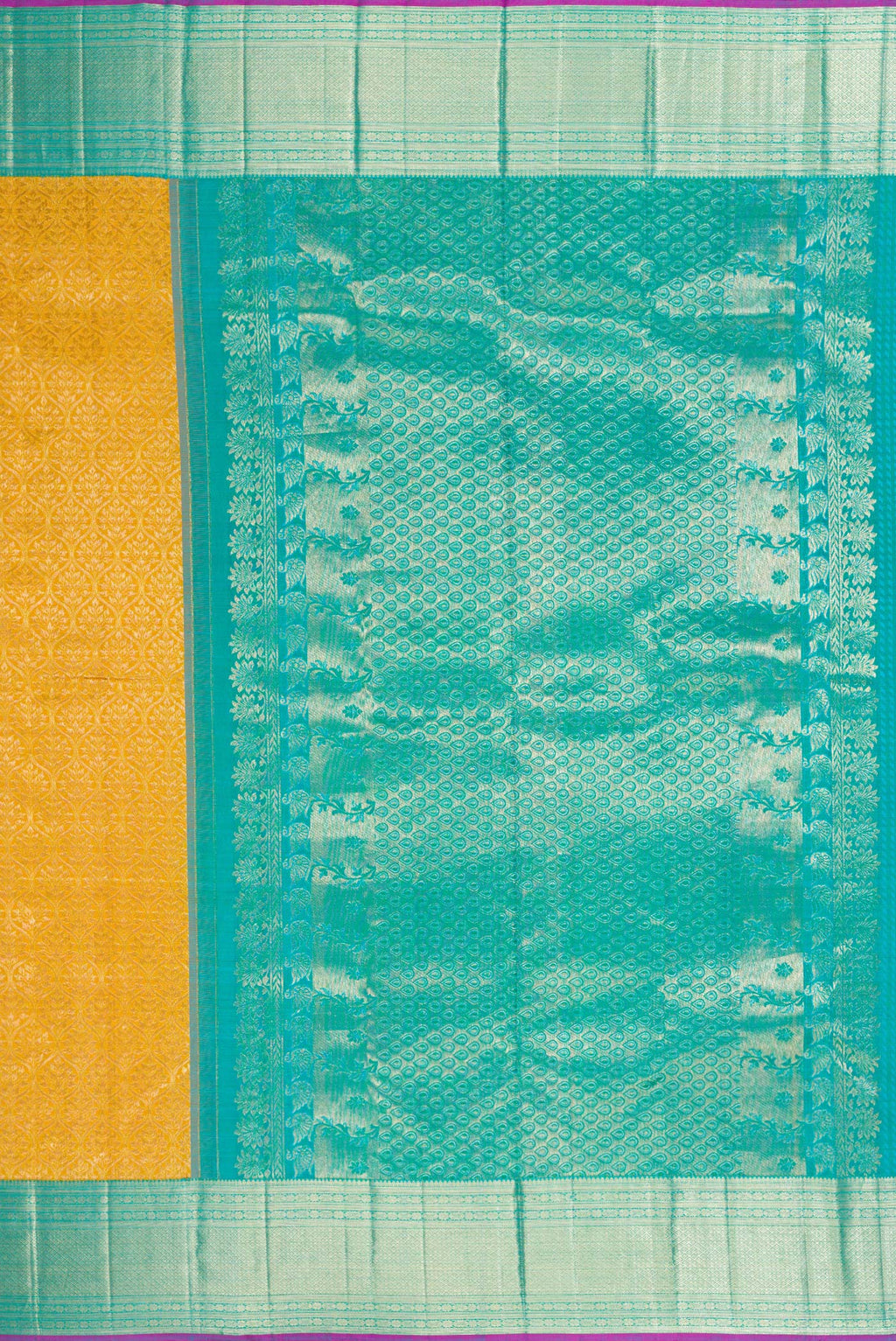 Close up image of the pallu of Mustard Dual Tone Kanchipuram Silk Saree with Zari Brocade on the body and Zari Border. 