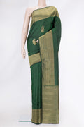 Bottle Green Dual Tone Kanchipuram Silk Saree with Zari Butta on the body and Zari Border.  displayed on a mannequin