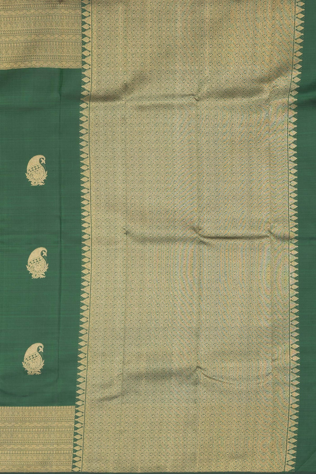Close up image of the pallu of Bottle Green Dual Tone Kanchipuram Silk Saree with Zari Butta on the body and Zari Border. 