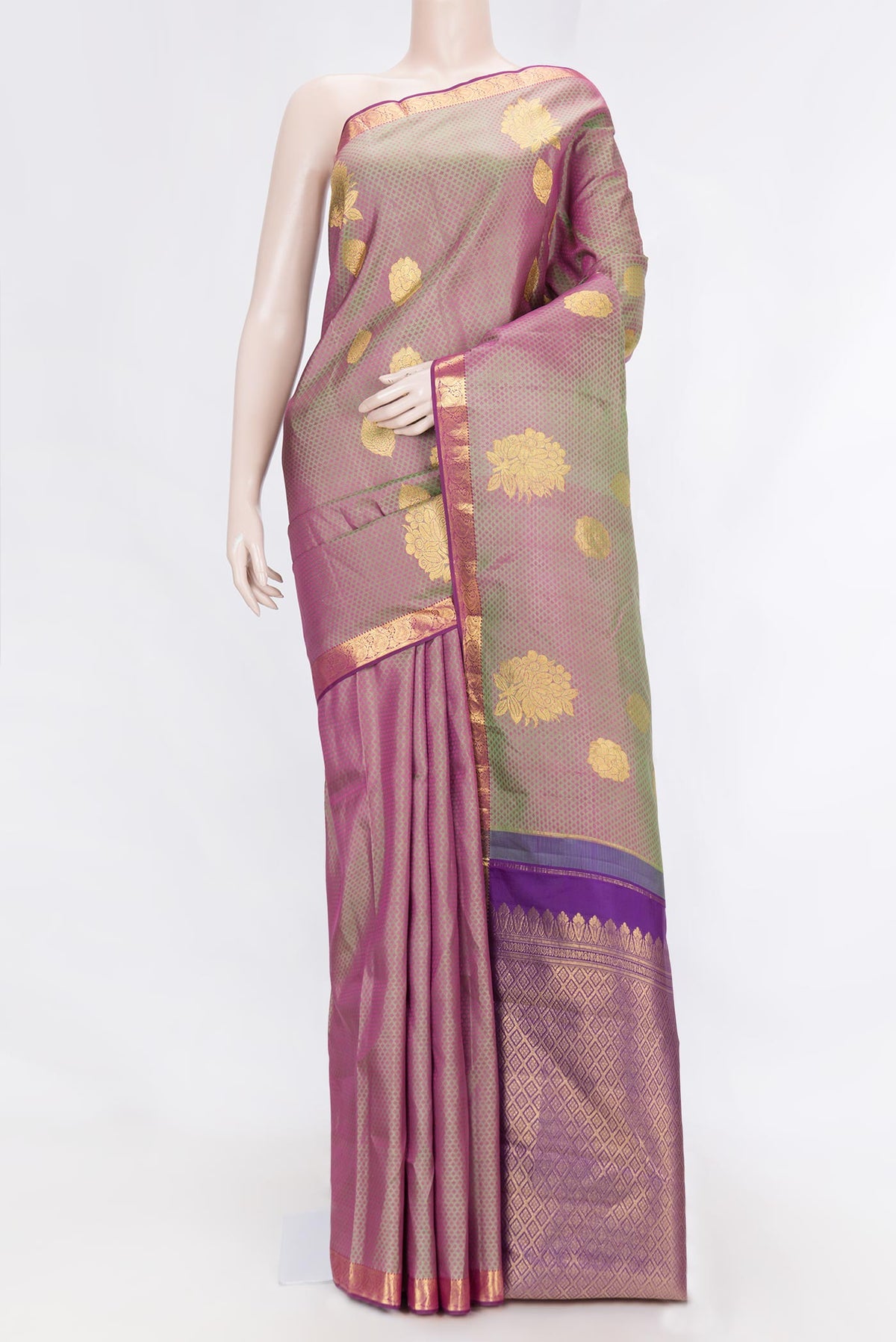 Light Green Dual Tone Kanchipuram Silk Saree with Jacquard With Zari Butta on the body and Zari Border displayed on a mannequin