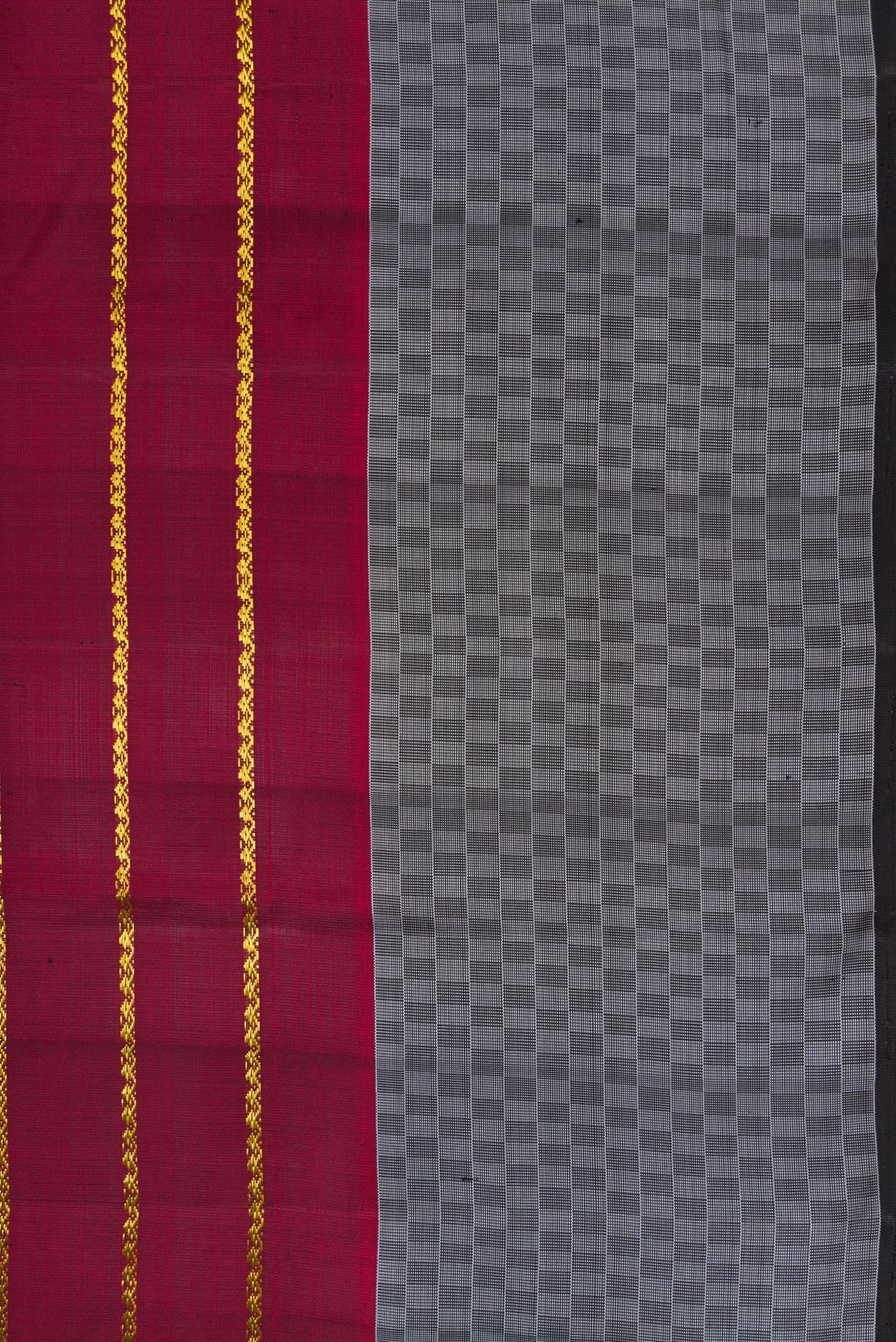 Border image of Maroon Dual Tone Kanchipuram Silk Saree with Stripes on the body and Checks Border. 