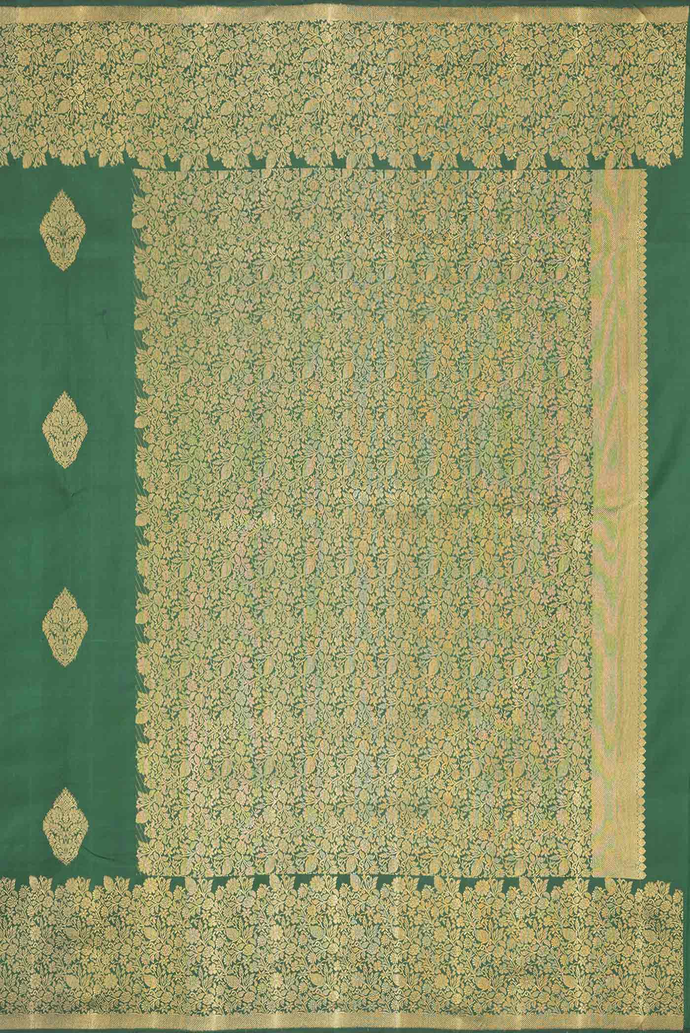 Close up image of the pallu of Pure Silk Pure Zari Bottle Green Dual Tone Kanchipuram Saree with Zari Butta on the body and Zari Border