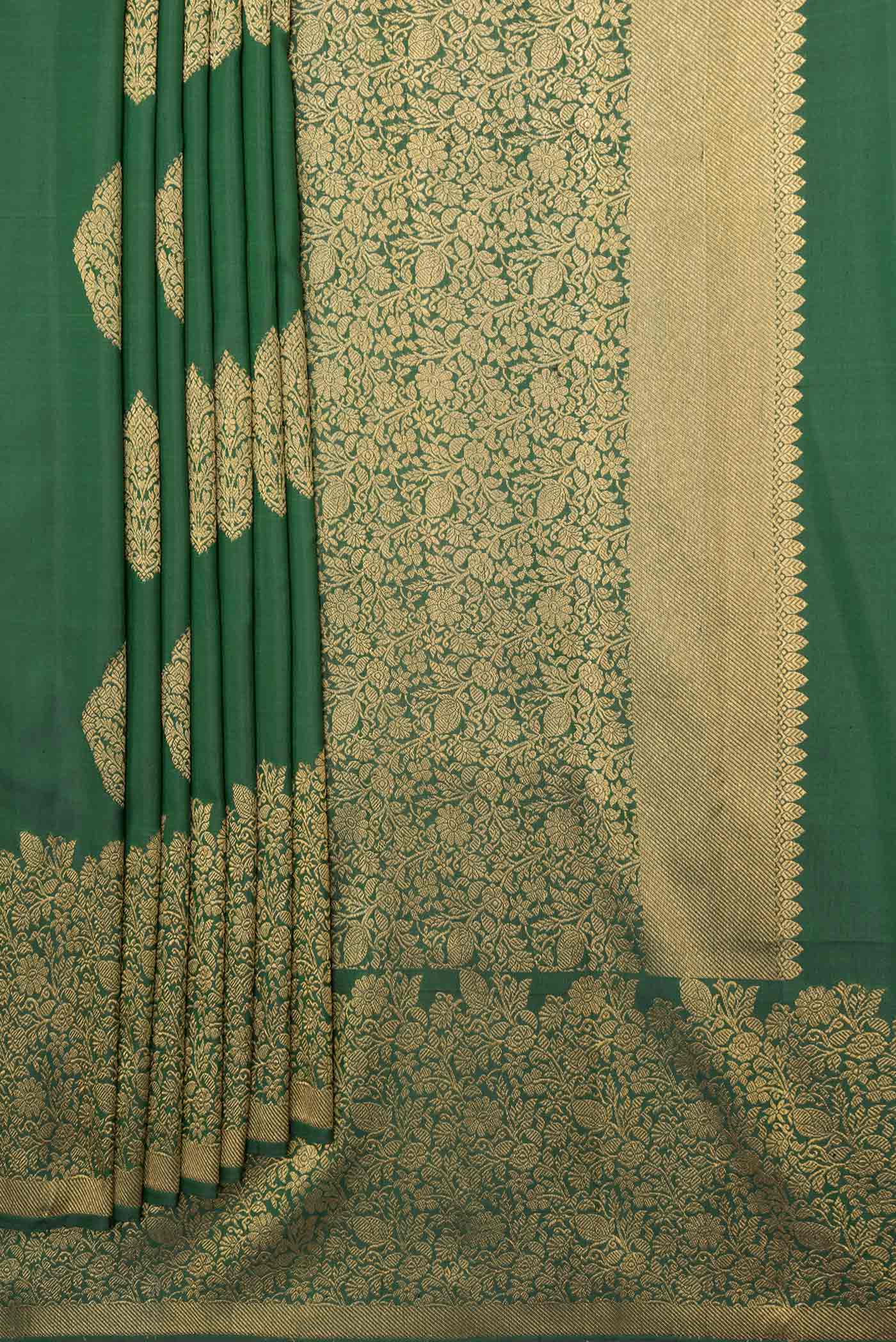 Pleats and pallu of Pure Silk Pure Zari Bottle Green Dual Tone Kanchipuram Saree with Zari Butta on the body and Zari Border