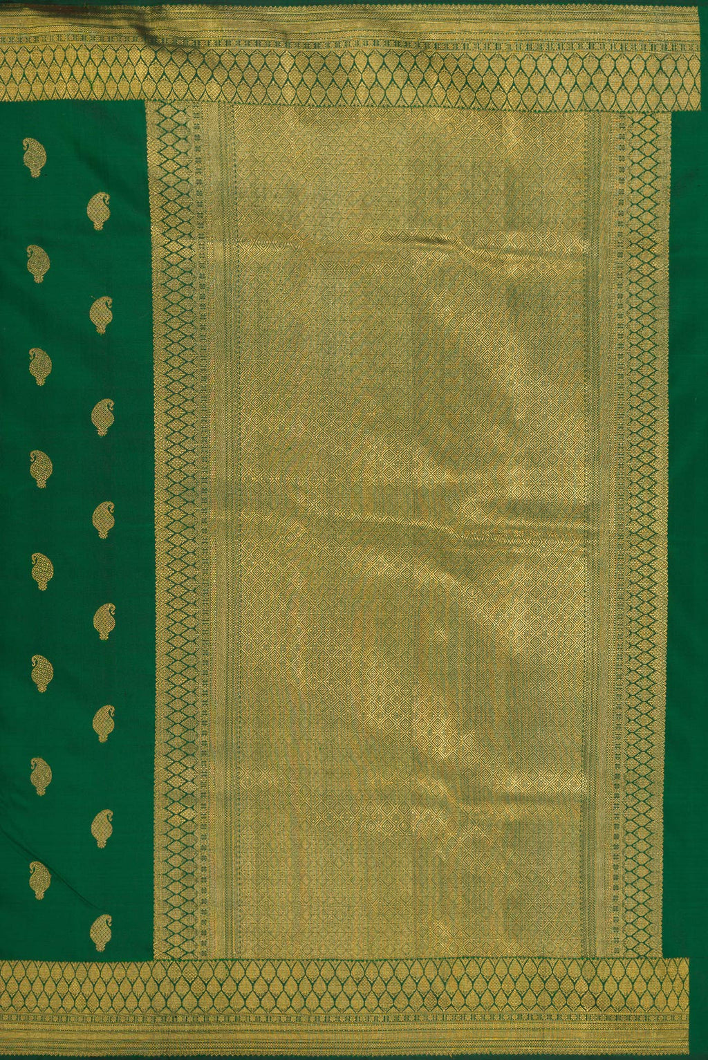 Close up image of the pallu of Pure Silk Pure Zari Green Kanjivaram Saree with Zari Butta on the body and Zari Border. 