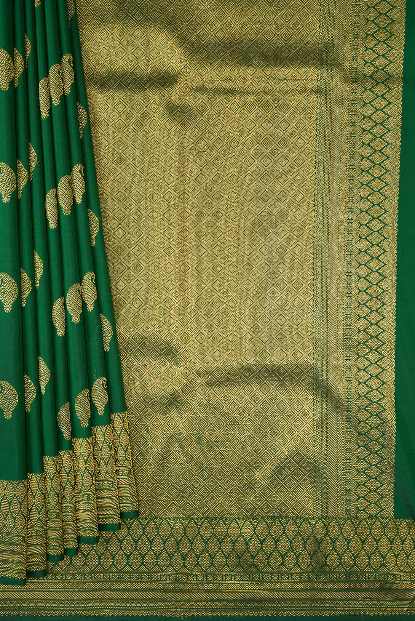 Pleats and pallu of Pure Silk Pure Zari Green Kanjivaram Saree with Zari Butta on the body and Zari Border. 