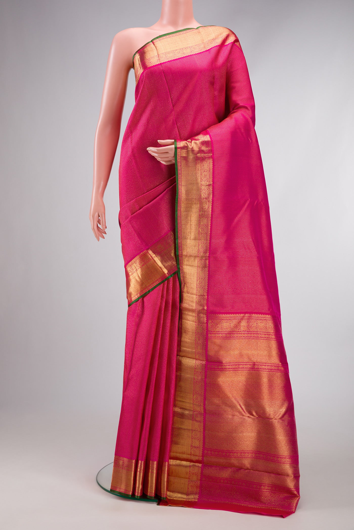 Pure Silk Pure Zari Pink Dual Tone Kanjivaram Saree with Zari Brocade on the body and Zari Border.  displayed on a mannequin
