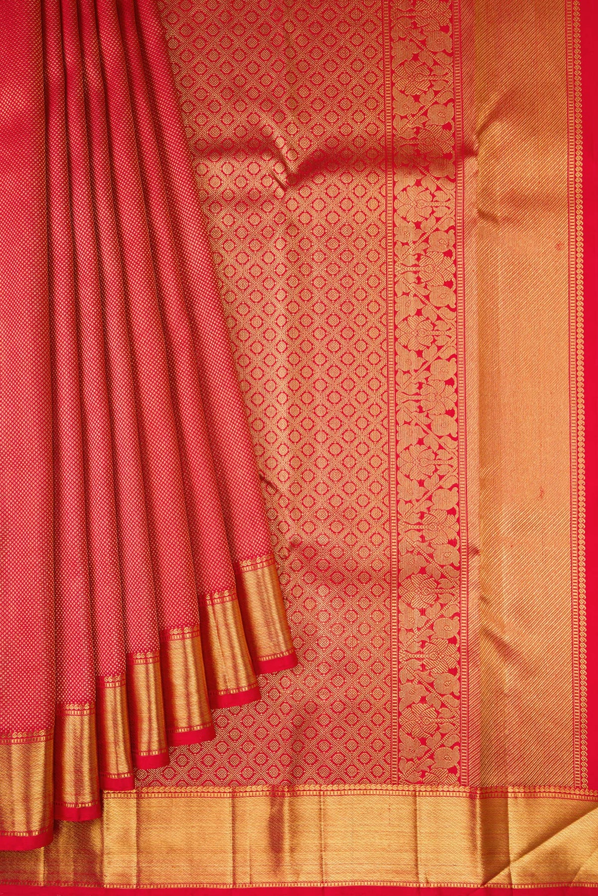 Pleats and pallu of Pure Silk Pure Zari Red Dual Tone Kanjivaram Saree with Zari Brocade on the body and Zari Border. 