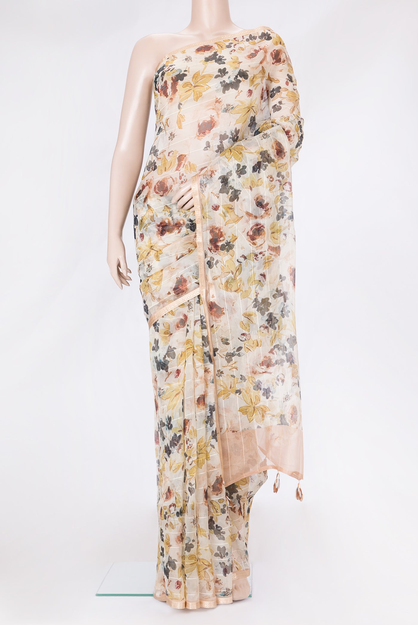 Sandal Dual Tone Organza Silk Saree with Printed design on the body and Zari Border.  displayed on a mannequin