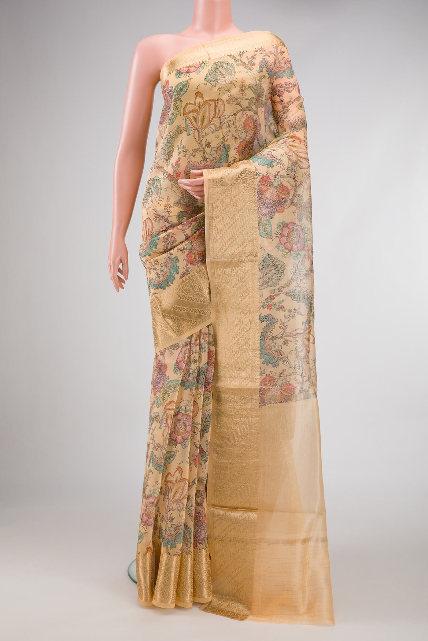 Sandal Dual Tone Organza Silk Saree with Printed design on the body and Zari Border.  displayed on a mannequin