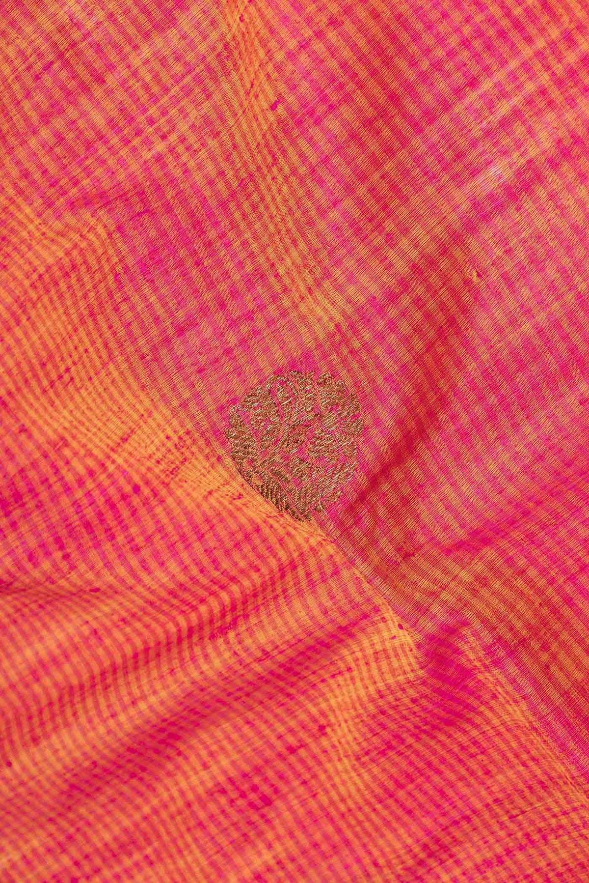 Close up of Mustard Dual Tone Banarasi Saree with Zari Butta on the body and Zari Border displaying folds