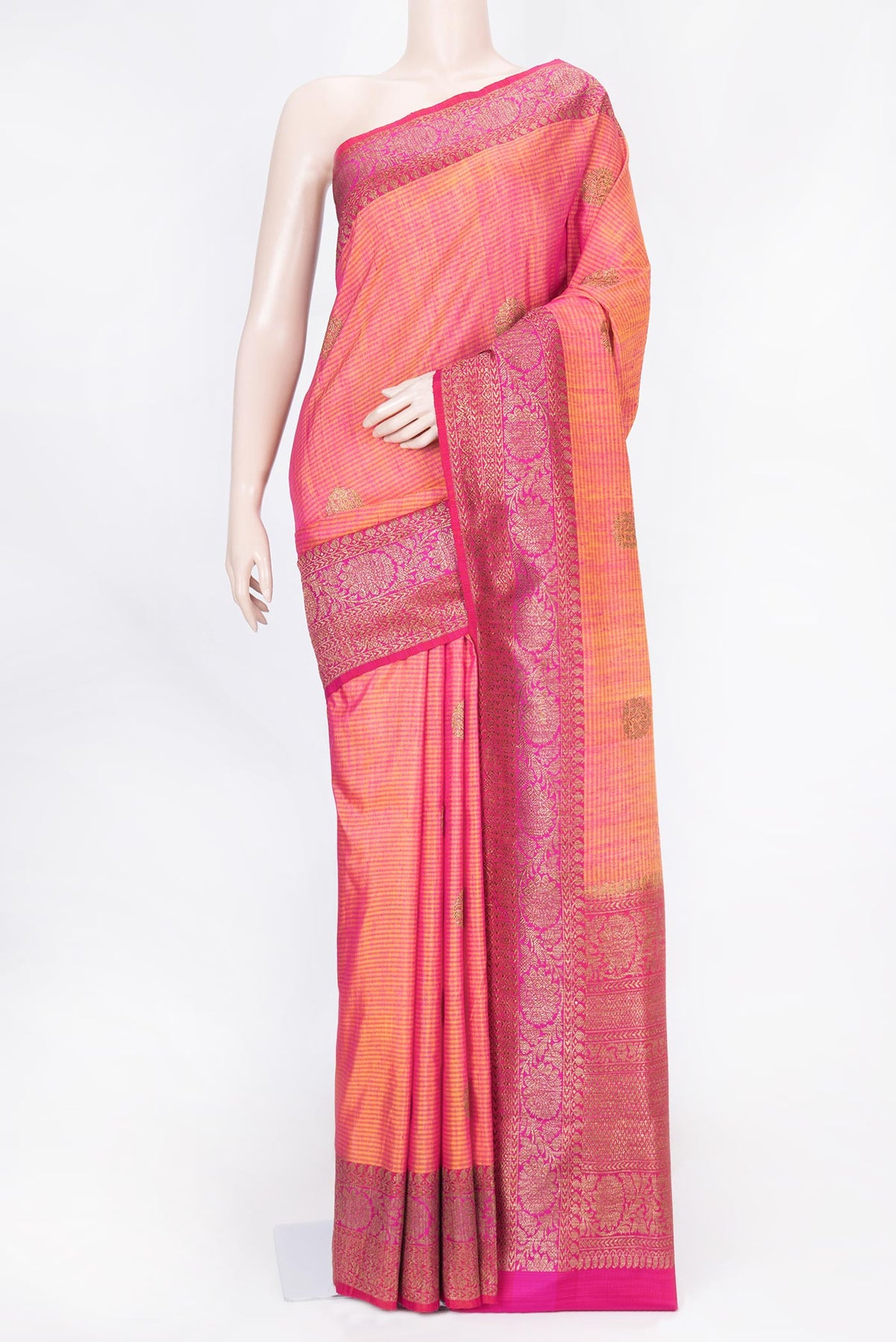 Mustard Dual Tone Banarasi Saree with Zari Butta on the body and Zari Border displayed on a mannequin