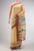 Sandal Dual Tone Organza Silk Saree with Embroidery on the body and Printed Border.  displayed on a mannequin