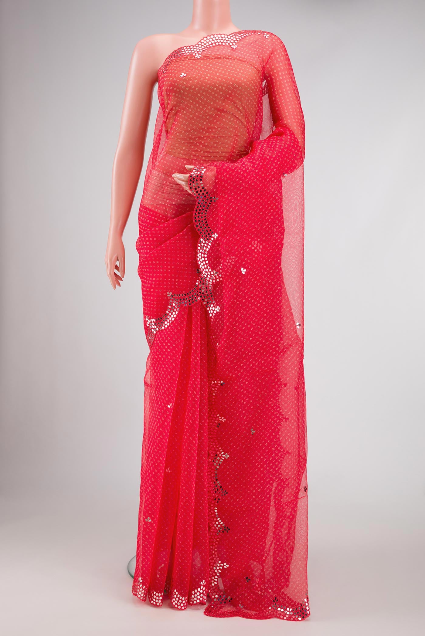 Red Dual Tone Organza Silk Saree with Embroidery on the body and Embroidery Border.  displayed on a mannequin