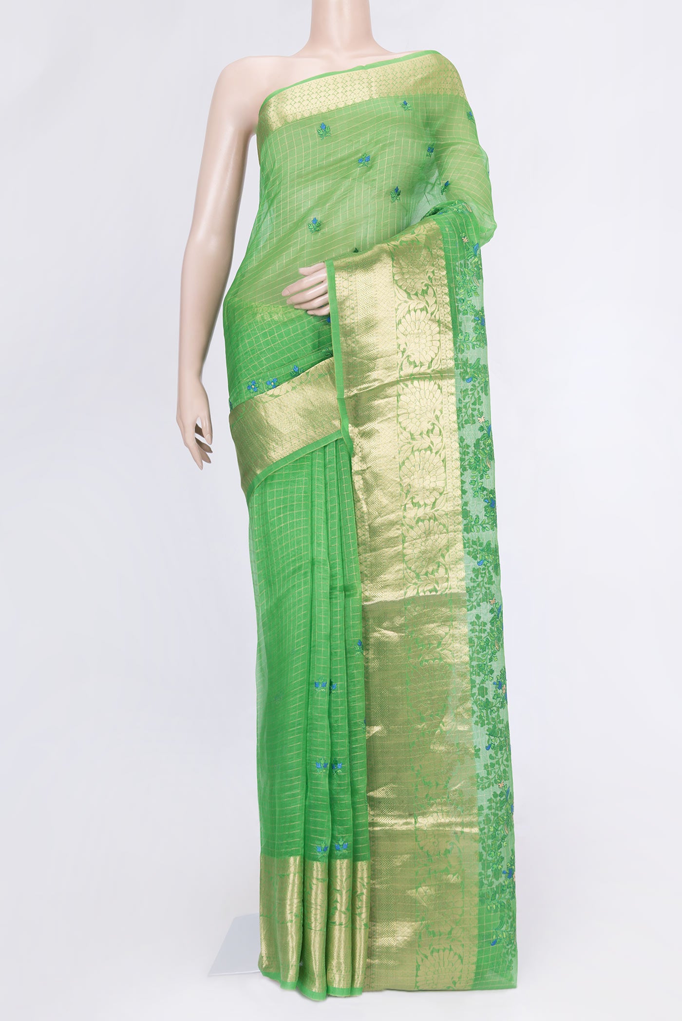 Light Green Dual Tone Organza Silk Saree with Embroidery on the body and Zari Border.  displayed on a mannequin