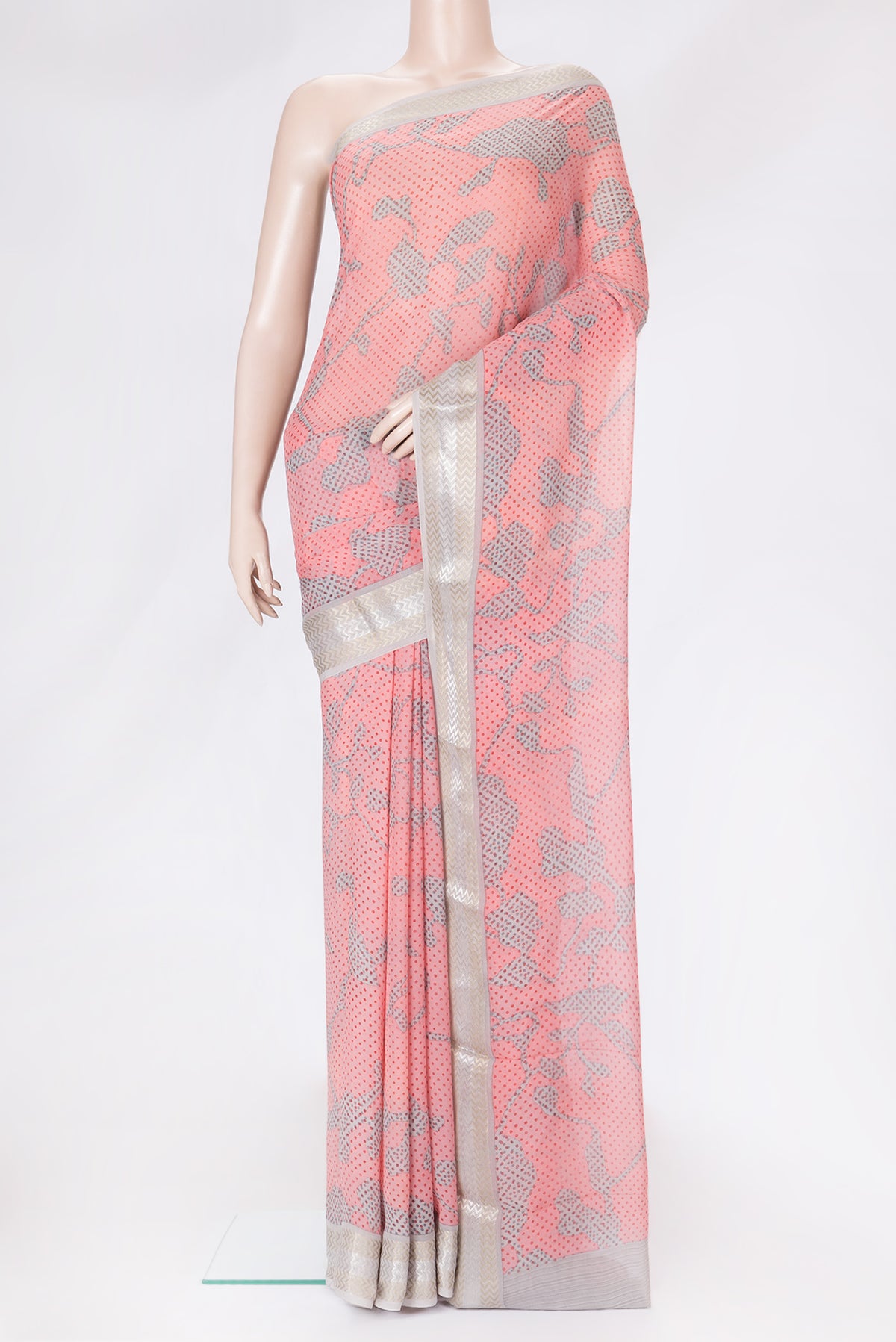 Pink Dual Tone Mysore Georgette Saree with Printed design on the body and Zari Border.  displayed on a mannequin