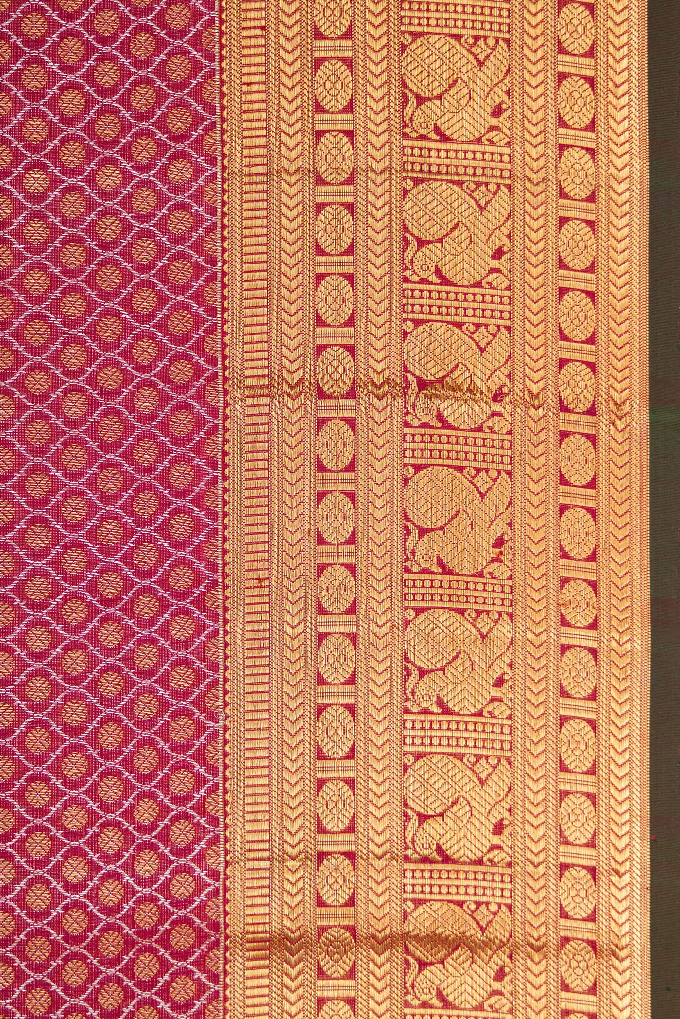 Border image of Maroon Dual Tone Kanchipuram Silk Saree with Zari Brocade on the body and Zari Border. 