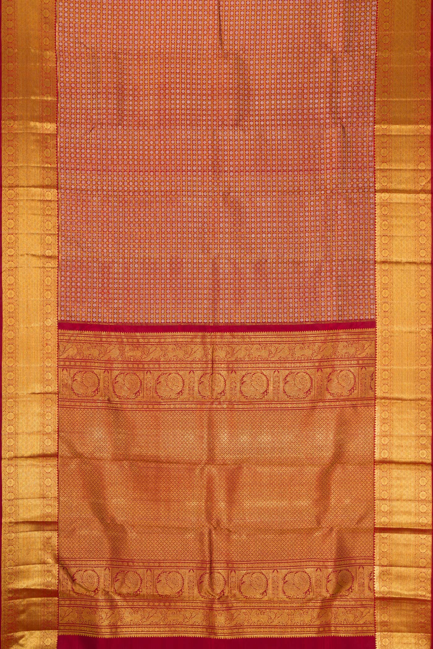 Flat view of Maroon Kanchipuram Silk Saree with Zari Brocade on the body and Zari Border. 
