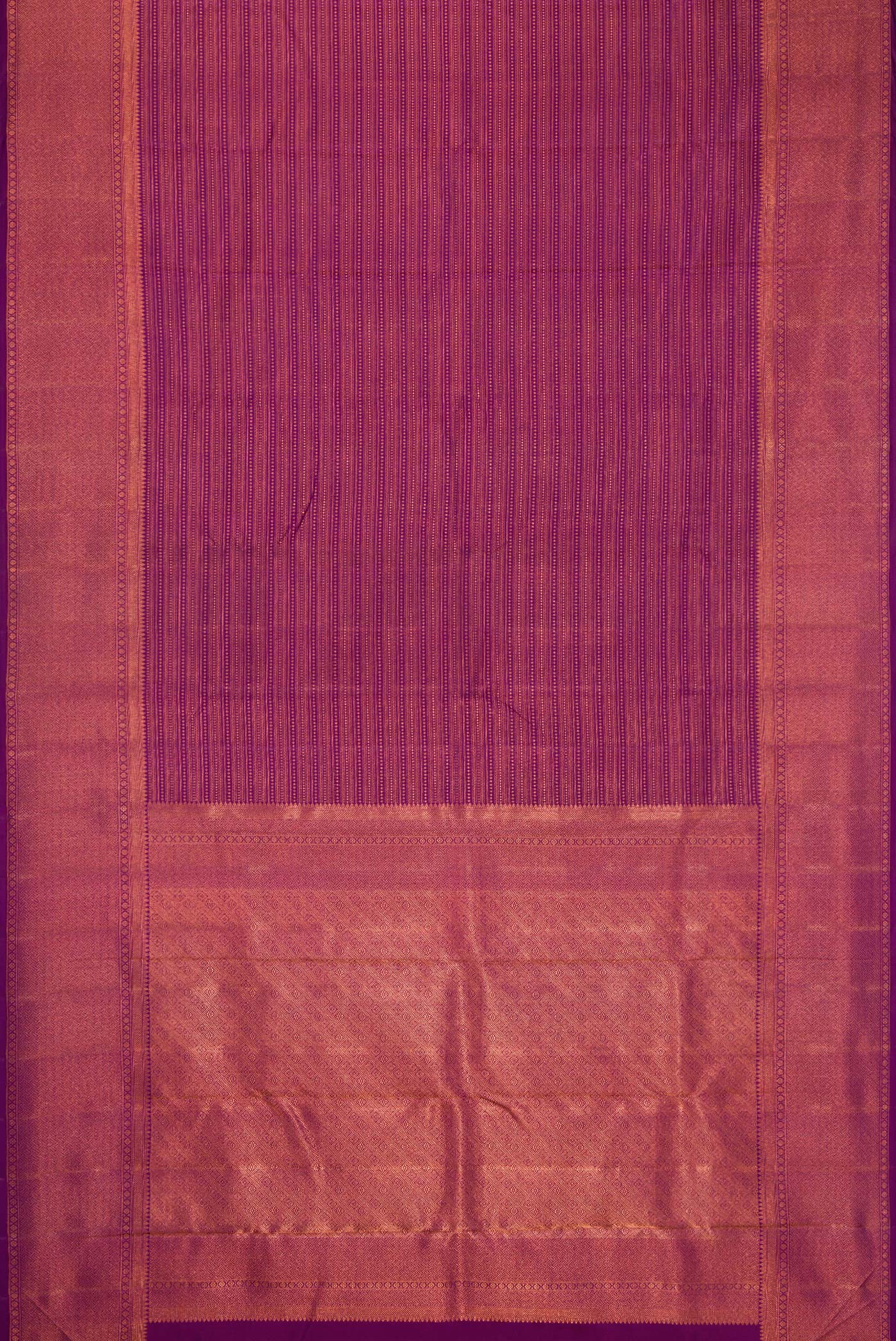 Flat view of Purple Dual Tone Kanjivaram Silk Saree with Zari Brocade on the body and Fancy Border. 