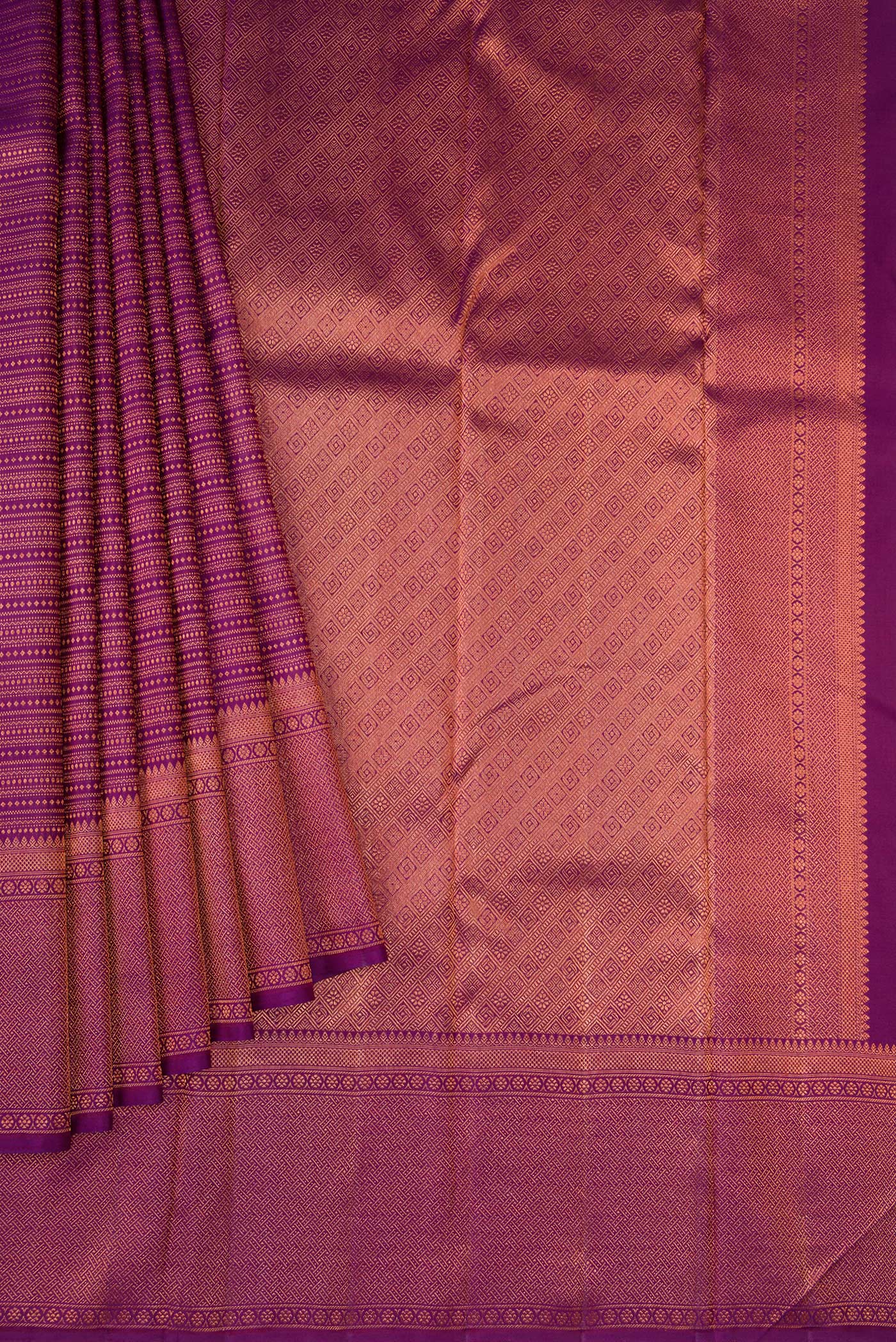 Pleats and pallu of Purple Dual Tone Kanjivaram Silk Saree with Zari Brocade on the body and Fancy Border. 
