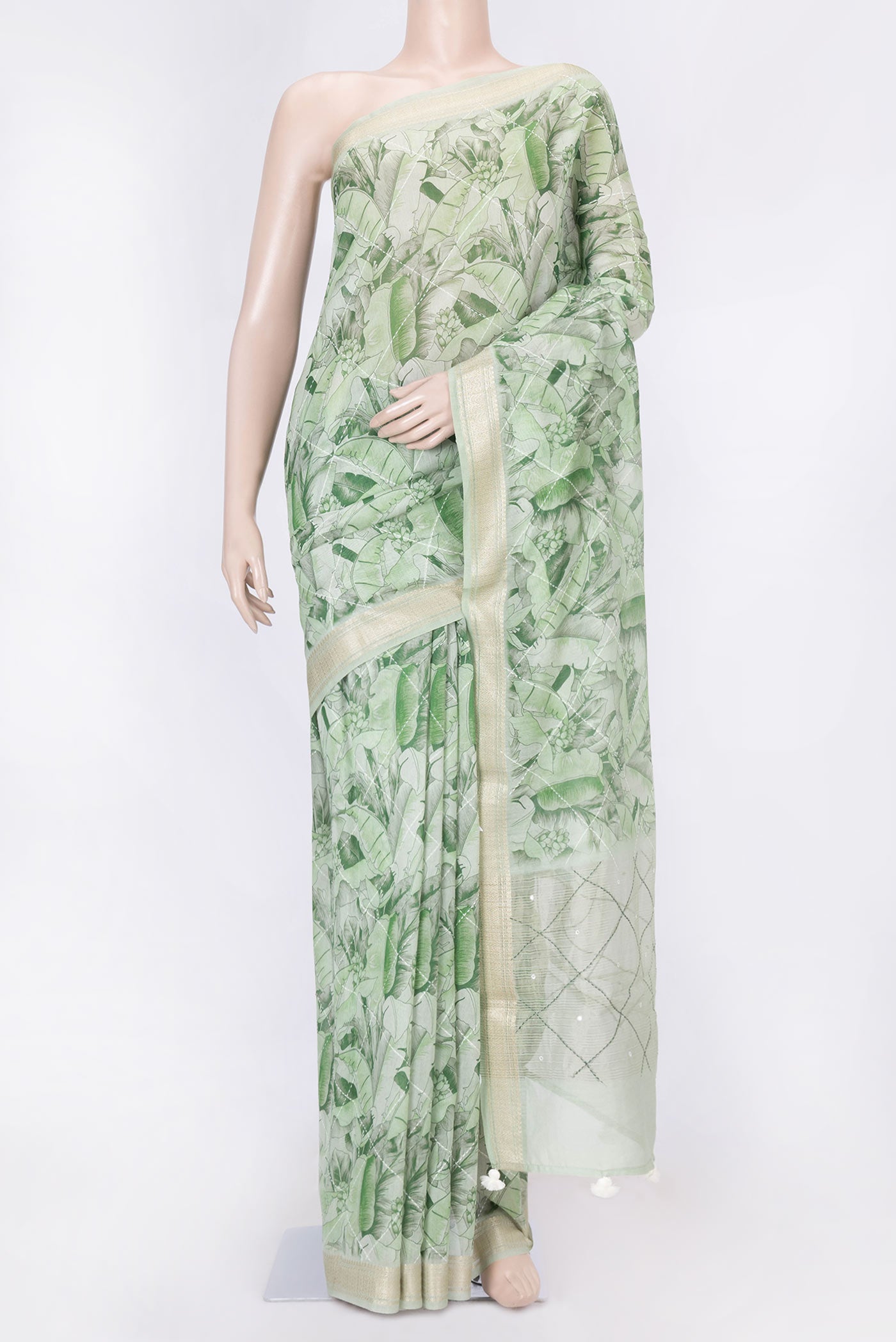 Green Dual Tone Chanderi Silk Saree with Printed design on the body and Zari Border displayed on a mannequin