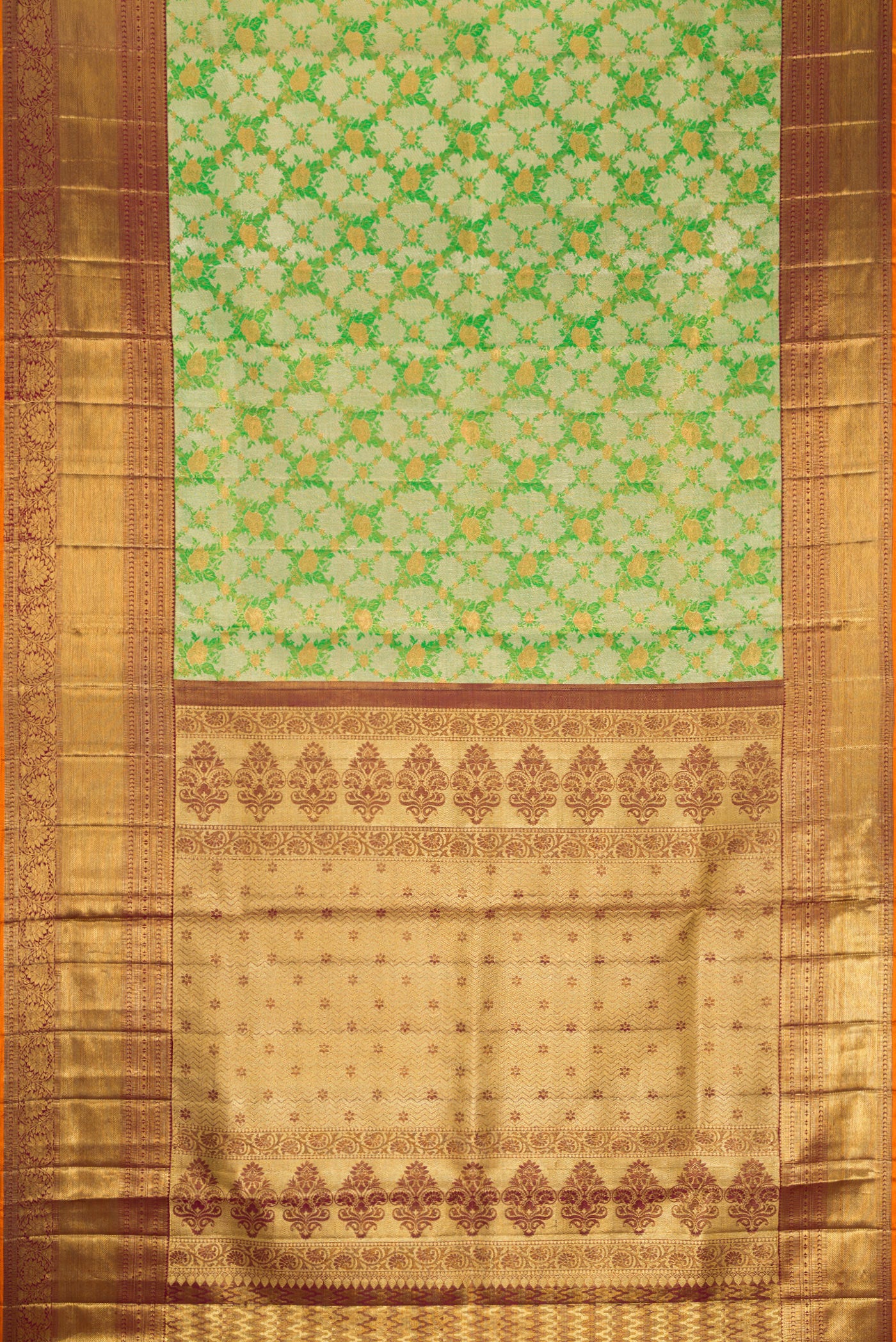 Flat view of Green Dual Tone Kanjivaram Tissue Silk Saree with Zari Brocade on the body and Zari Border. 