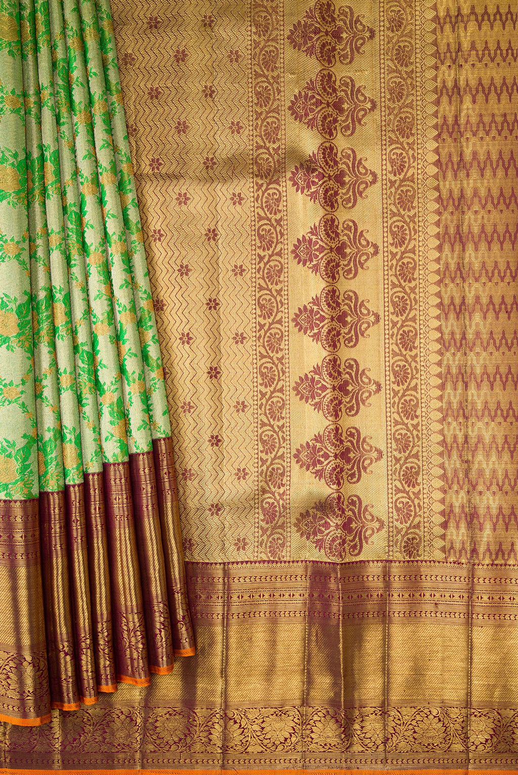 Pleats and pallu of Green Dual Tone Kanjivaram Tissue Silk Saree with Zari Brocade on the body and Zari Border. 