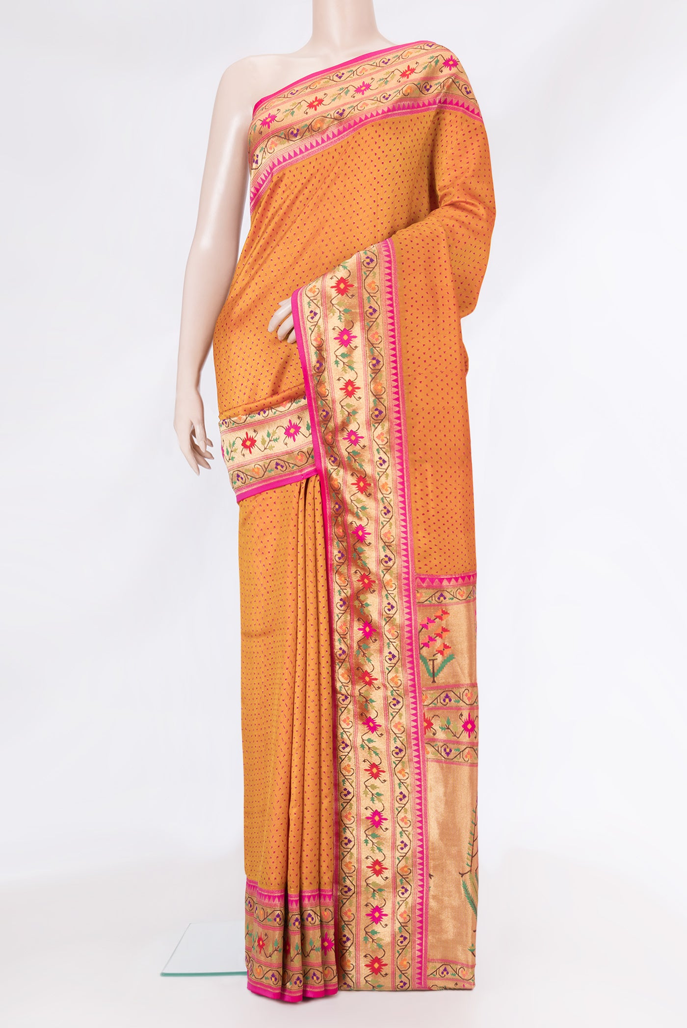 Mustard Dual Tone Double Ikat Saree with Ikat Print on the body and Paithani Border.  displayed on a mannequin