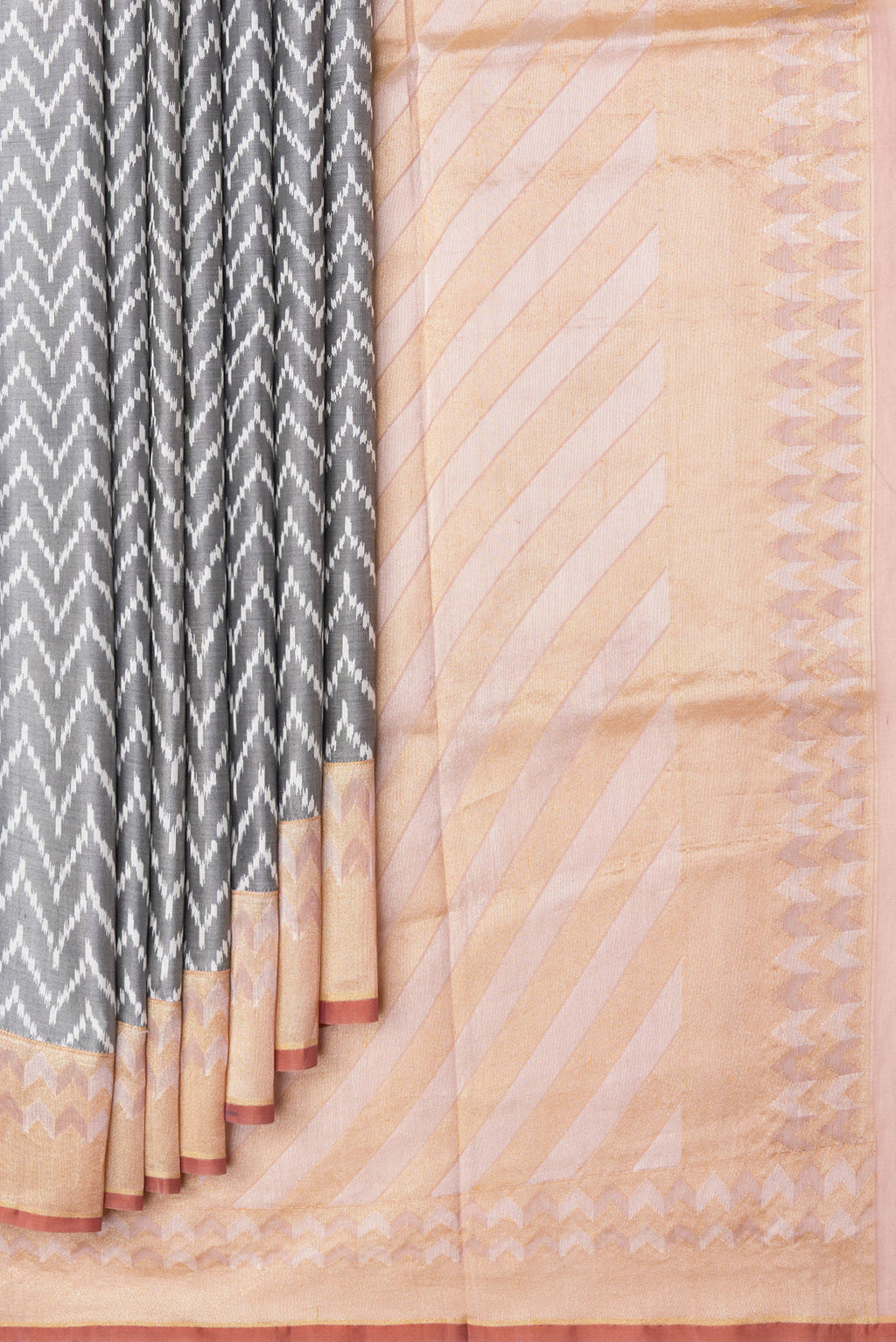 Pleats and pallu of Grey Dual Tone Double Ikat Saree with Ikat Print on the body and Zari Border. 