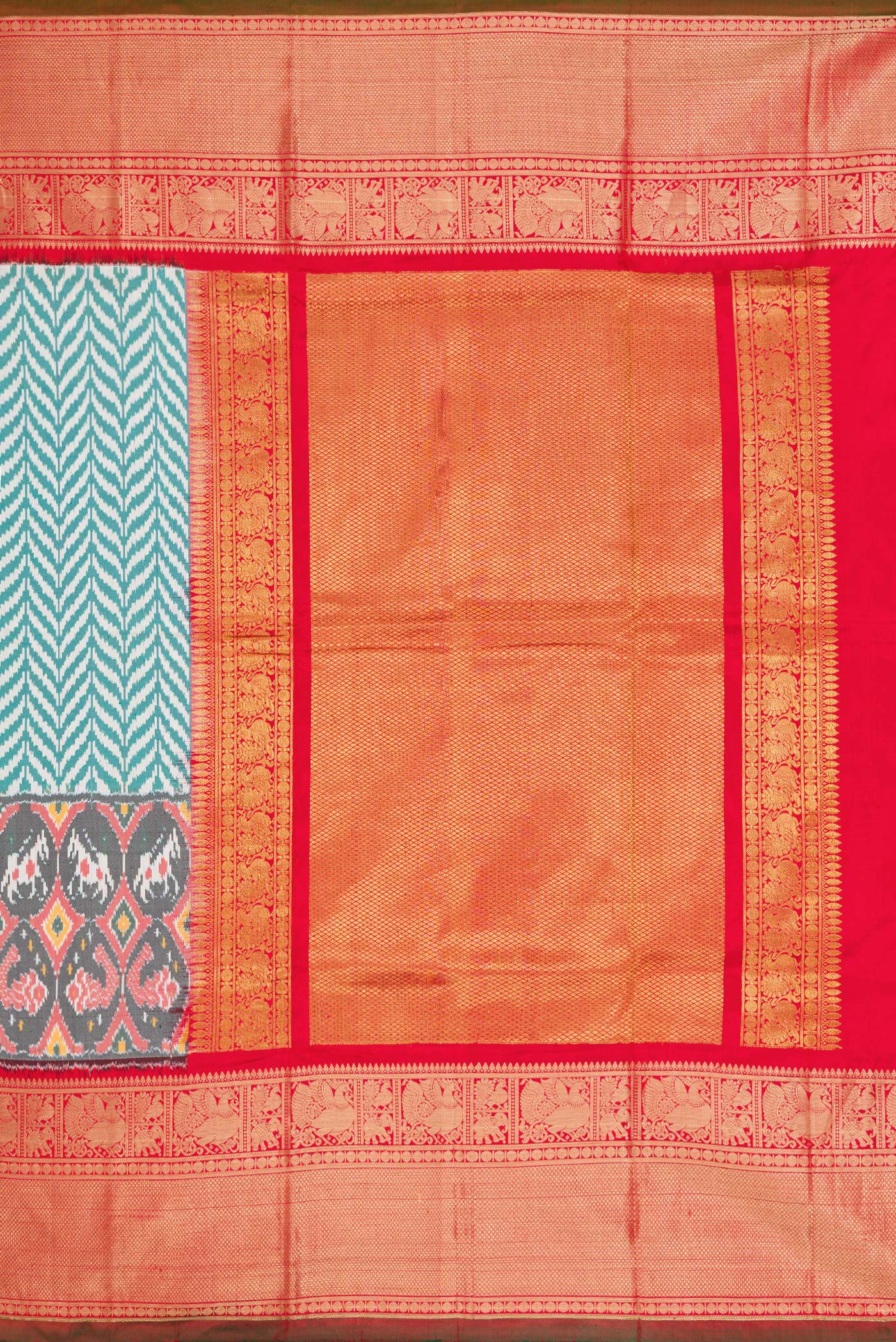 Close up image of the pallu of Off White and Green Color Double Ikat Saree with Ikat Print on the body and Ikat Border. 
