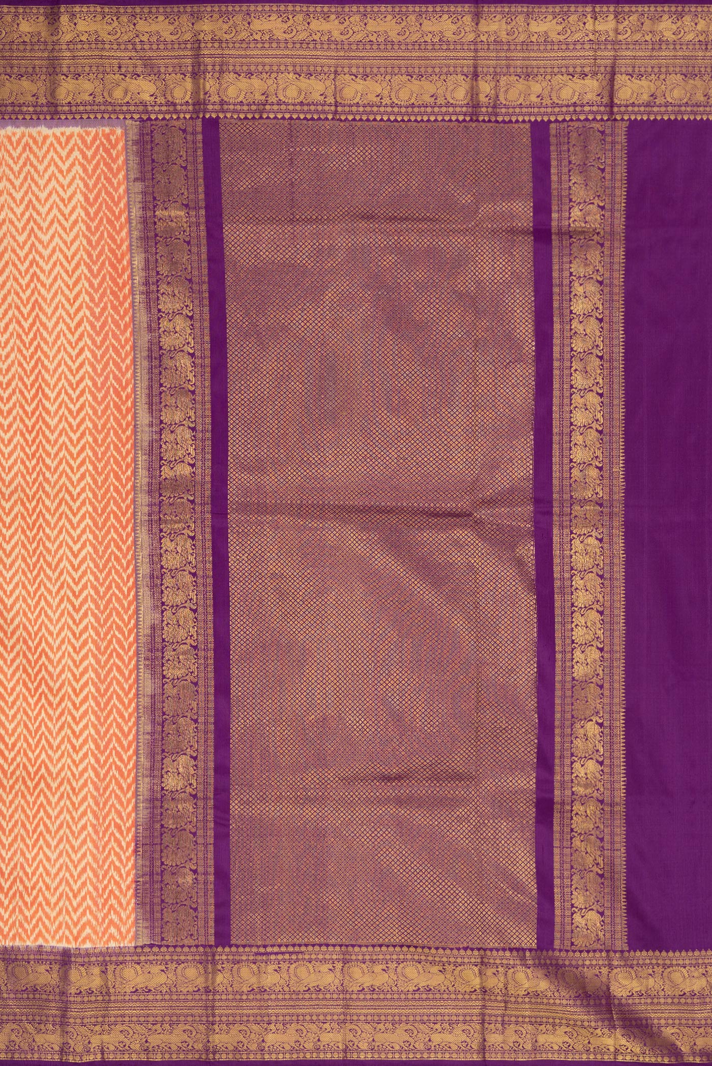 Close up image of the pallu of Orange Dual Tone Double Ikat Saree with Ikat Print on the body and Ikat Border. 
