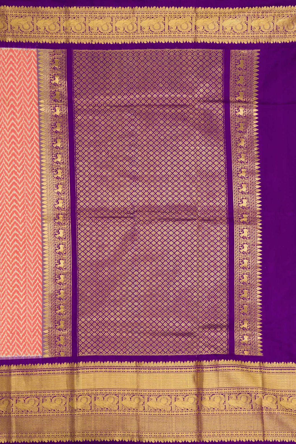 Close up image of the pallu of Off White and Orange Color Double Ikat Saree with Ikat Print on the body and Zari Border. 