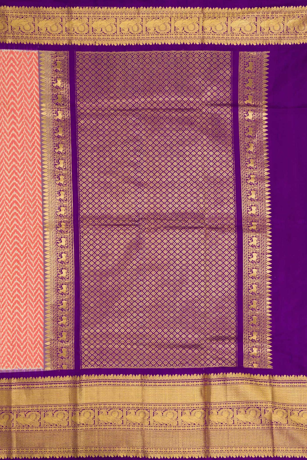 Close up image of the pallu of Off White and Orange Color Double Ikat Saree with Ikat Print on the body and Zari Border. 